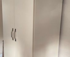 Wardrobe cream with silver handles