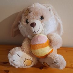 Easter Bunny holding egg