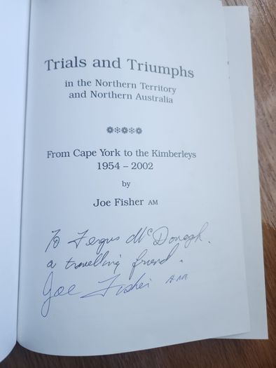 Trials And Triumphs In The Northern Territory And Northern Australia.   From Cape Yorkto The Kimberleys 1954-2002.by Joe Fisher. Signed First Edition Large Volume Hardback In Very Good Condition.