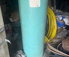 Hot water cylinder with immersion