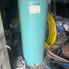 Hot water cylinder with immersion