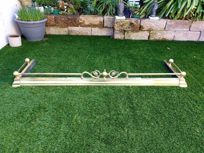 brass fireplace Fender