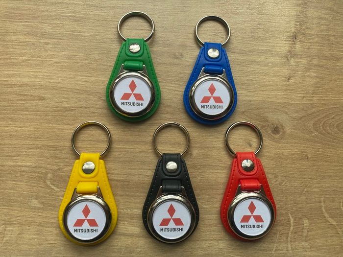 Brand new synthetic leather Mitsubishi keyring with shopping trolley token/coin