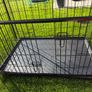 XL dog crate opens up by sliding doors at front and side. Read caption Image 3