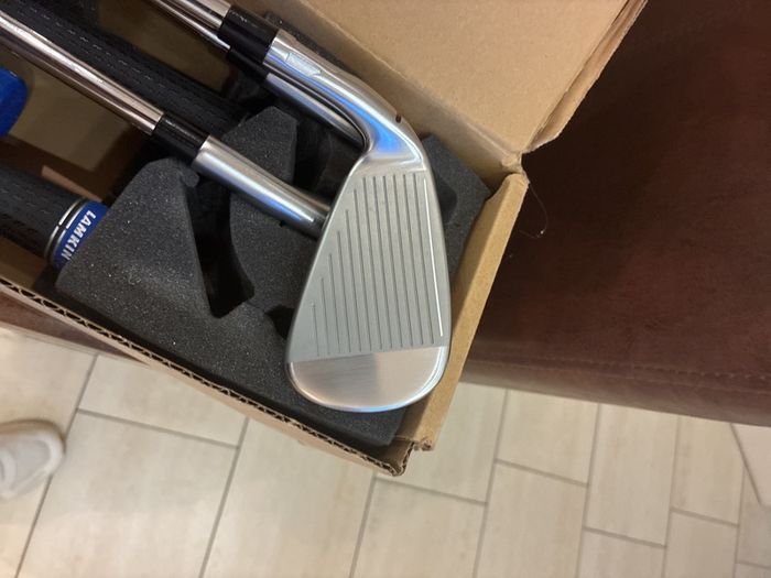 Taylormade Qi Irons 5 to SW regular flex still in the box 9 iron and 5 iron hit once wrappers still on irons