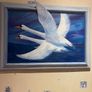 A commissioned painting of two swans with the wing of one swan overlapping the frame Image 2