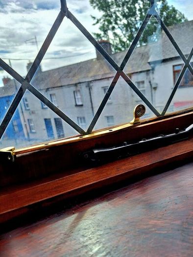 Vintage brass window stays
