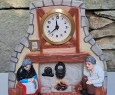 Mechanical fireside picture Clock