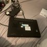 laptop and earbuds Image 4
