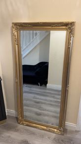 Large gold framed mirror