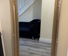Large gold framed mirror