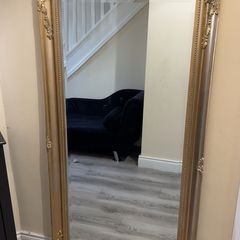 Large gold framed mirror