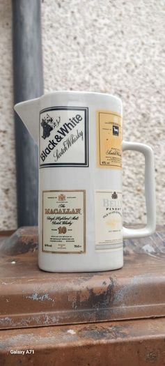 Scotch whiskey advertising jug, unusual with 4 brands on it ,nice to any collectors collection, lovely display item, price includes post to anywhere in Ireland thank you, sold as is