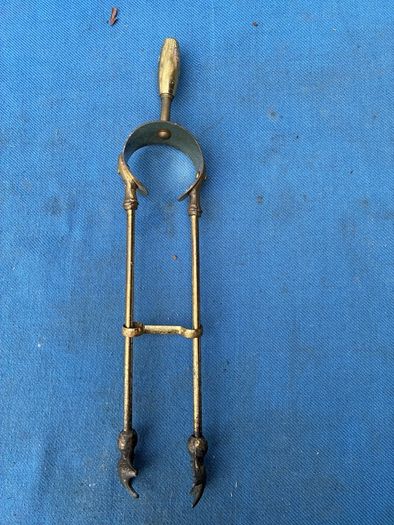 Vintage brass fire tongs