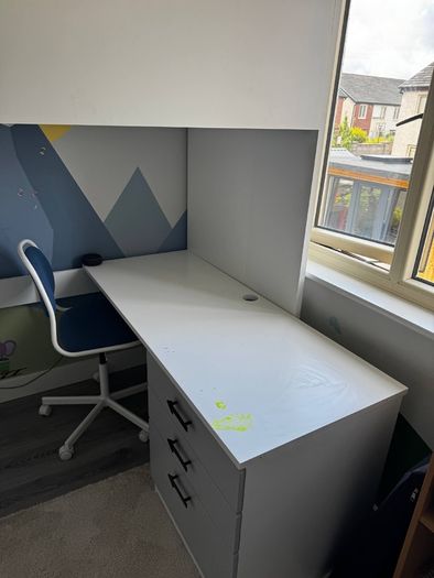 Bed with wardrobe and desk