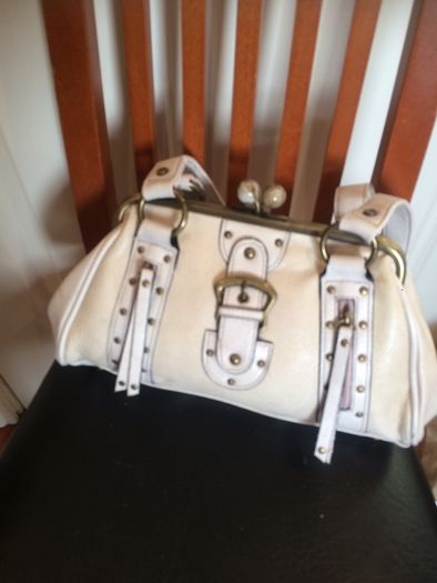 Hand bags. Rucksacks, clutch bags, purses