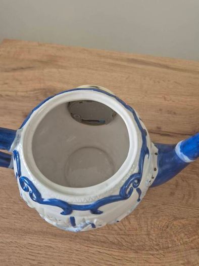 Blue and white ceramic teapot with quartz clock