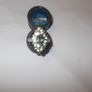 a silver dress ring with white stones  and a green stone stamped 925 china Image 2