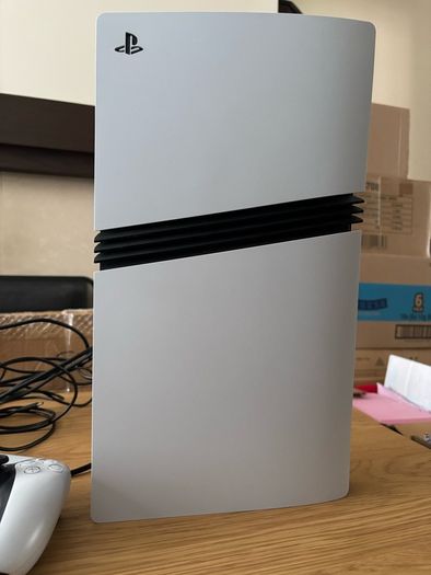 PS5 PRO console and controller in mint condition