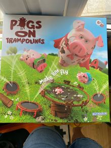 Pigs on trampolines board game