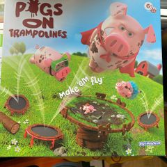 Pigs on trampolines board game