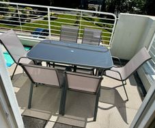 Six Seat Patio Dining Set with umbrella and weighted base