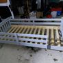 Grey single bed with sides and new mattress Image 2
