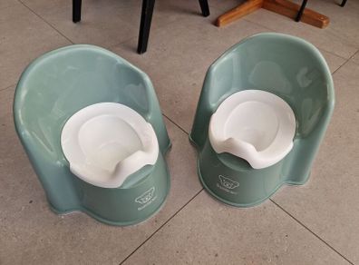Two baby bjorn potties