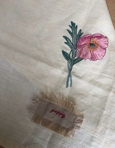 Poppy embroidered cotton tea cloth