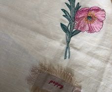 Poppy embroidered cotton tea cloth