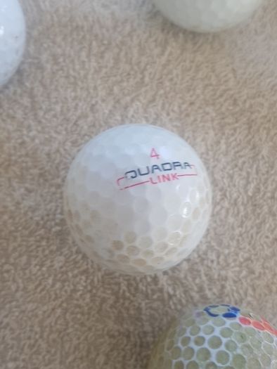 golf ball and tees