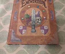 enchiridion and Marcy's super secret scrapbook.