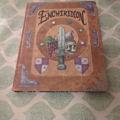 enchiridion and Marcy's super secret scrapbook.