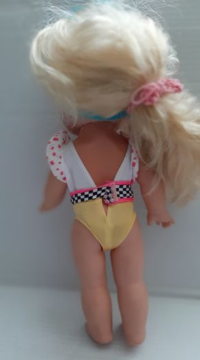 collectable vintage matel doll in original clothes