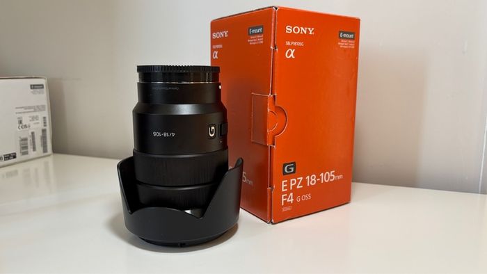 Sony ZVE-10 + Sony E 18-105mm f/4 lens (cage and 5 batteries)