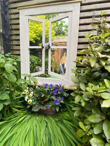 Garden reflection mirror window