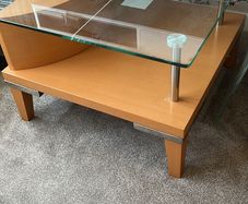 Glass topped coffee table