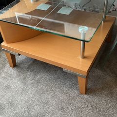 Glass topped coffee table