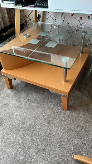 Glass topped coffee table