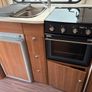 Adria Altea 6 birth triple bunk caravan & awning Image 2
