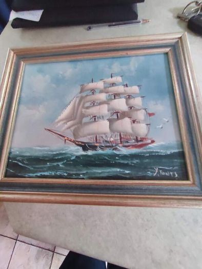 Framed oil of a sailing ship on board signed Y. Jones