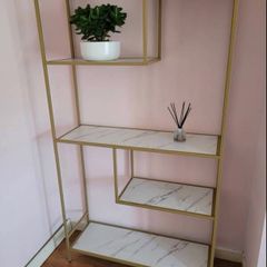 Gold and marble effect unit for sale