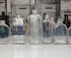 294 - Set of 7 Vintage Clear Glass Decorative Collectible Display Household Bottles