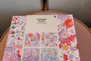 4 jigsaw puzzles on decorative box
