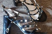 Totally fabulous black patent stud heels