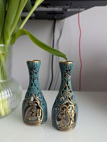 Two candle holders with Jerusalem scene