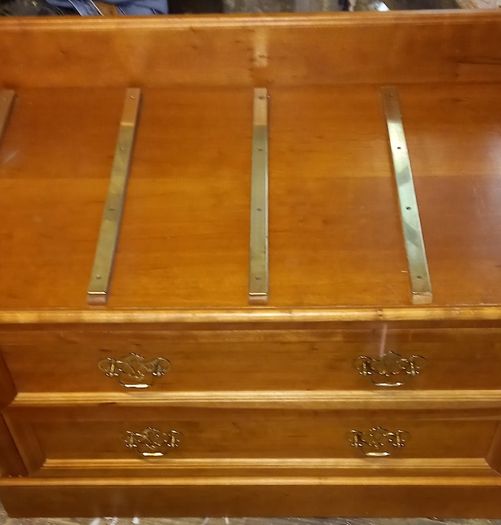 Chest with suitcase set down on top