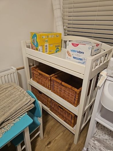 changing table with 4 good sturdy baskets