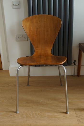 A pair of vintage Danish stackable dining chairs