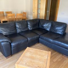 Black leather L shaped couch